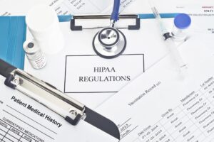 Top view of HIPAA regulations report with some stethoscope