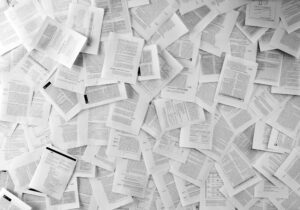 Close up image of so many papers lying on the floor